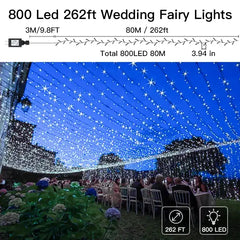 Ollny 800 LED 262ft Cool White Wedding String Lights (Green Cable, Plug in, 8 Modes, IP44 Waterproof)