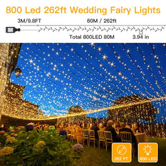 Ollny 800 LED 262ft Warm White Wedding String Lights (Green Cable, Plug in, 8 Modes, IP44 Waterproof)